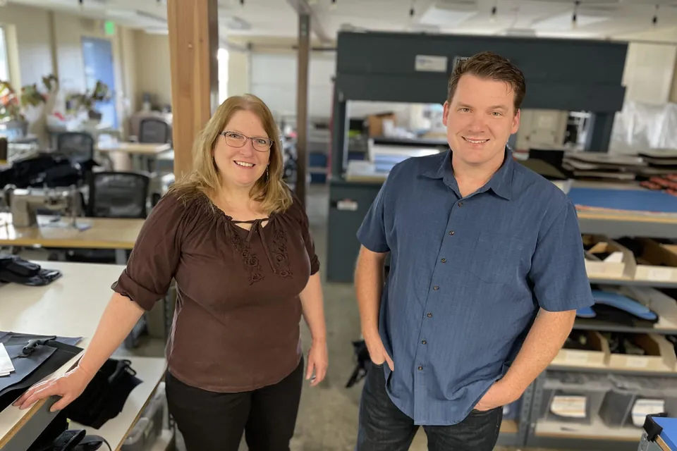 Matt and Julieann Cowell in the Cowell Tactical shop