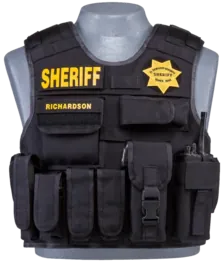 Black external armor carrier with a SHERIFF panel, star badge and pouches