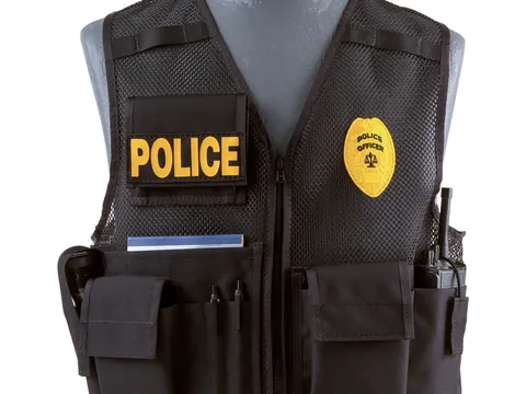Black identification vest with a POLICE panel and badge patch